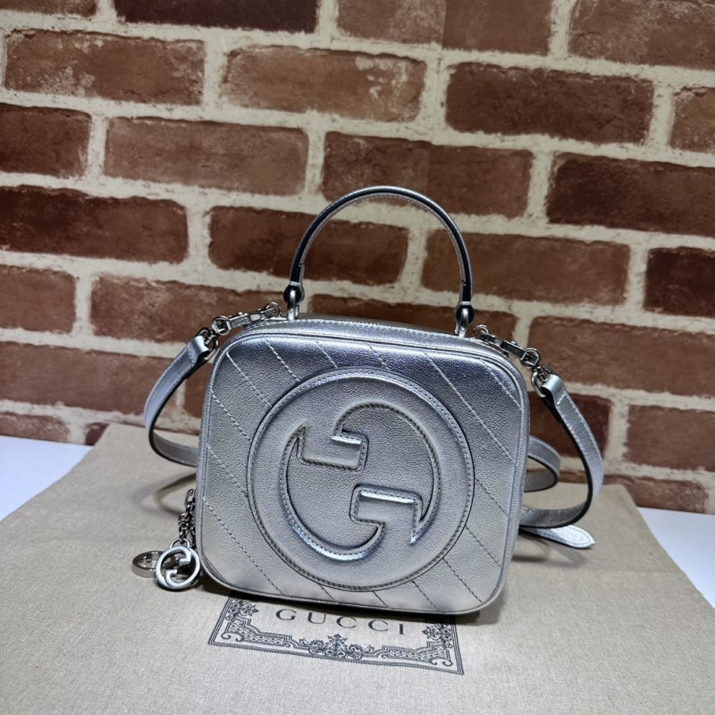 G*u*i top handle bags